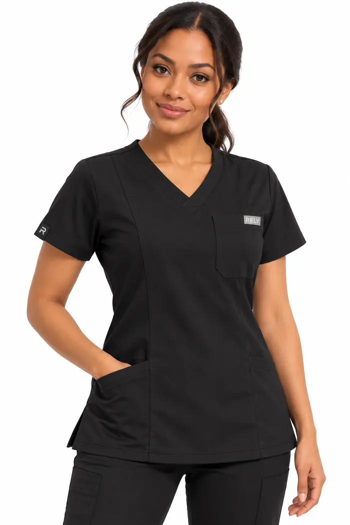 A woman in a black scrub top