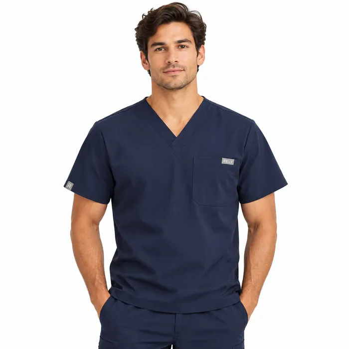 A man in a navy scrub top