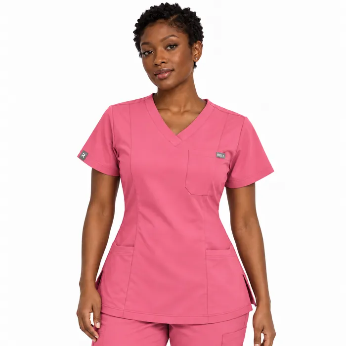 A woman in a rose scrub top